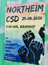 Fäuste auf Plakat werben für CSD -Umzug in Northeim!